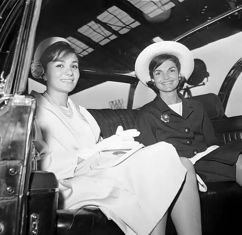 Mrs_ Kennedy and Empress Farah ride in a limousine from Washington