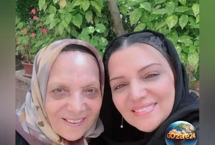 تصویر میز عزای مادر الهام پاوه‌نژاد با گل‌آرایی و شمع‌آرایی شاعرانه؛ یادبودی دل‌نشین در فضای مجازی