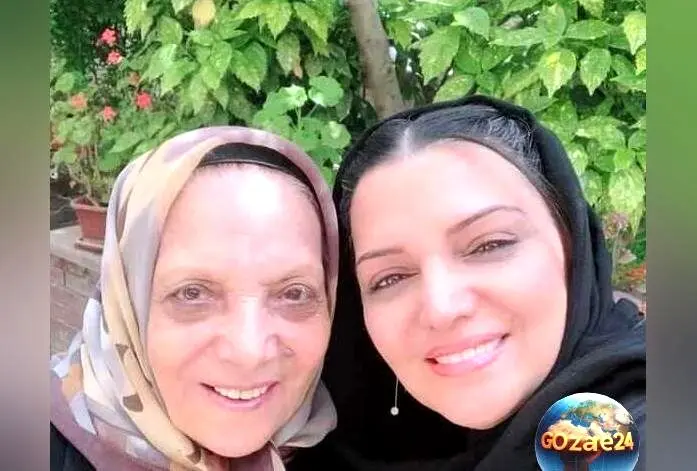 تصویر میز عزای مادر الهام پاوه‌نژاد با گل‌آرایی و شمع‌آرایی شاعرانه؛ یادبودی دل‌نشین در فضای مجازی