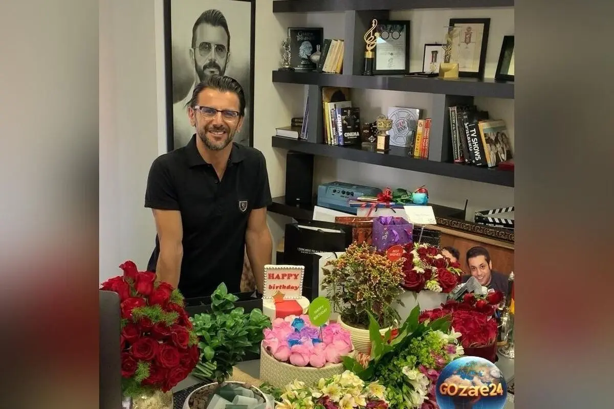 تصاویر و ویدیوهای دیزاین لوکس دفتر کار امین حیایی در روز تولدش با گل‌ها و کادوهای رنگارنگ