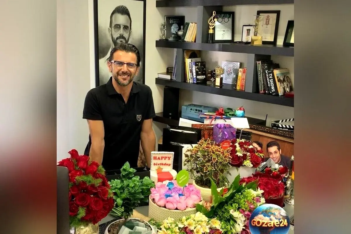 تصاویر و ویدیوهای دیزاین لوکس دفتر کار امین حیایی در روز تولدش با گل‌ها و کادوهای رنگارنگ