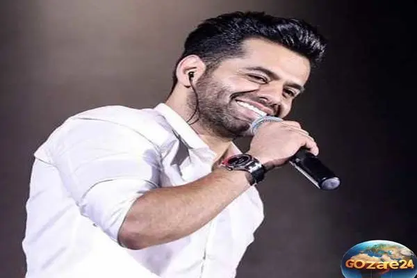 استایل آرام و روزمره رضا بهرام در حیاط خانه‌اش با هودی و شلوار مشکی + بیوگرافی و عکس جدید خواننده محبوب