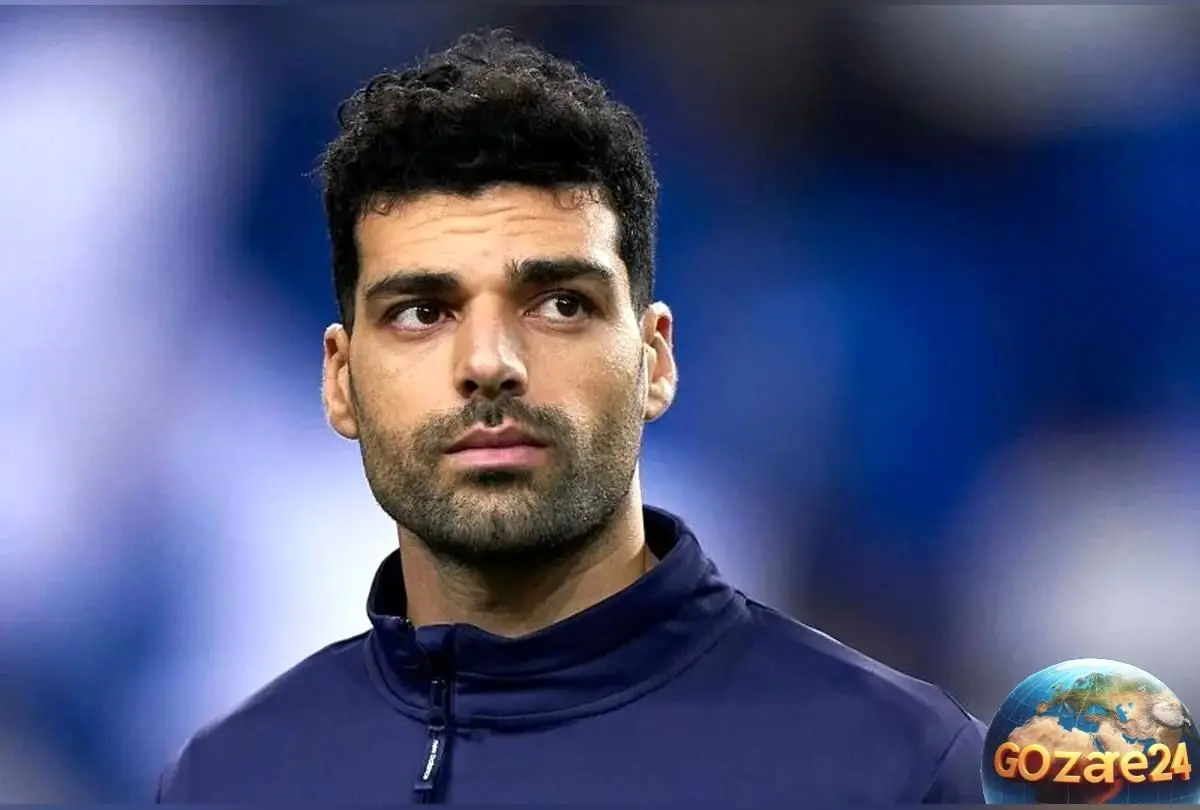 تصویر دیدنی و خنده‌دار مهدی طارمی در روز سیزده بدر؛ گره زدن سبزه و بهره‌گیری هوشمندانه از زمین چمن