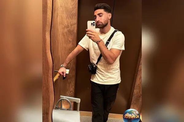 طراحی داخلی لوکس و اروپایی اتاق نشیمن علیرضا جهانبخش در هلند با چیدمان مدرن و شمع‌آرایی زیبا