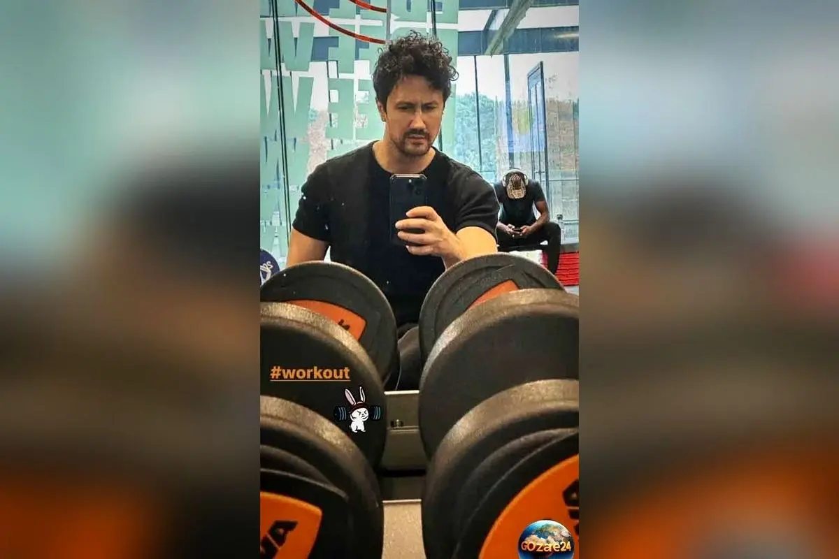 تصاویر جدید از هیکل ورزشی شاهرخ استخری در مقابل آینه باشگاه + عکس‌های جذاب و بازوهای قوی