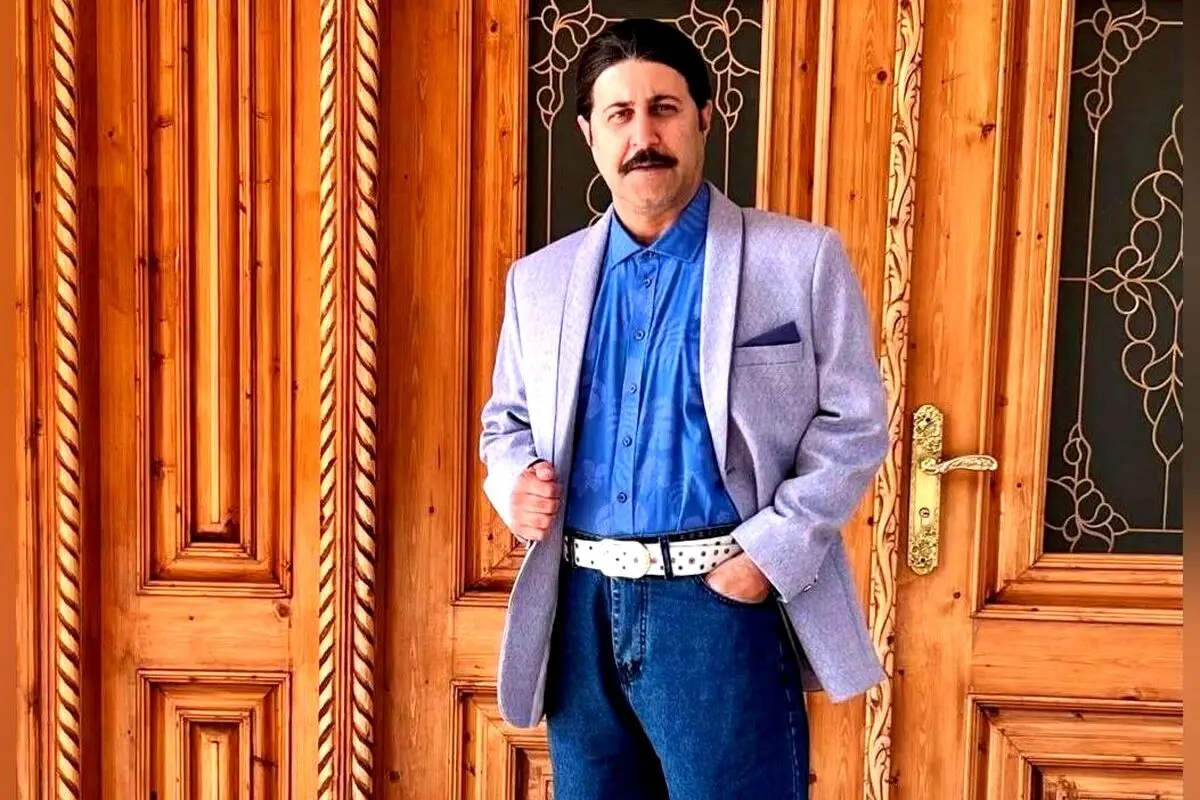 طراحی داخلی مدرن با مبلمان سبز و هنرهای معاصر در خانه رحمت پایتخت
