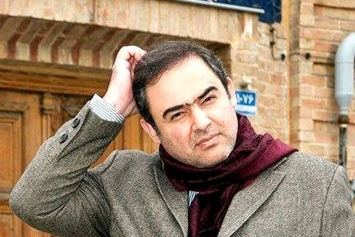 عکس نادر حسین دهباشی و وحید جلیلی در کنار سرباز آمریکایی در سفر به عراق پس از سقوط صدام