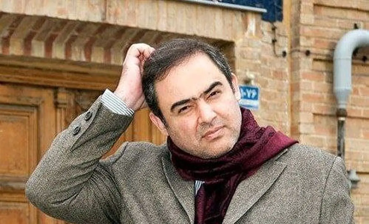 عکس نادر حسین دهباشی و وحید جلیلی در کنار سرباز آمریکایی در سفر به عراق پس از سقوط صدام