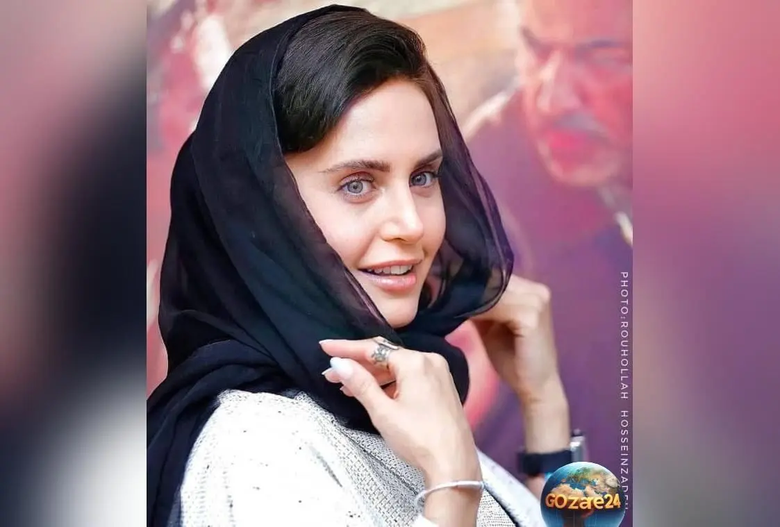 عکس الناز شاکردوست در طبیعت با کیک تولد شکلاتی و شمع‌های رنگارنگ در کنار آب